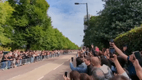 Spectators Line Streets as Queen's Cortege Moves Past Hyde Park