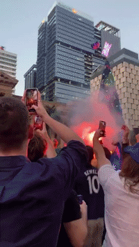 Socceroo Fans Light Flares in Brisbane for Australia's World Cup Match Against Argentina