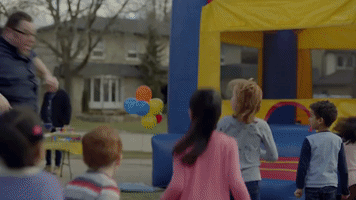 adweek parenting millennials bouncy castle GIF