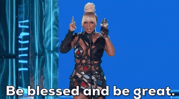 Celebrity gif. Mary J Blige is accepting an award at the Billboard Music Awards. She's wearing a cutout dress and says, "Be blessed and be great."