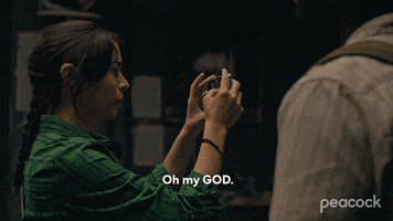 TV gif. Cristin Milioti as Emma in The Resort rolls her head back, totally exasperated, and drops her phone while saying "oh my God," which appears as text.