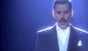 who wants to live forever queen GIF