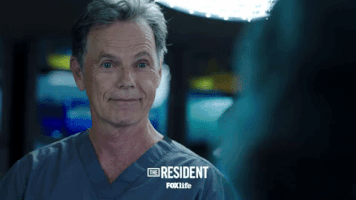 the resident wink GIF
