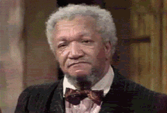 TV gif. Redd Foxx as Fred Sanford in Sanford and Son shaking his head, passing a glance to Bubba, who then looks to Skillet, who then looks to Leroy, who leans back contemplatively.