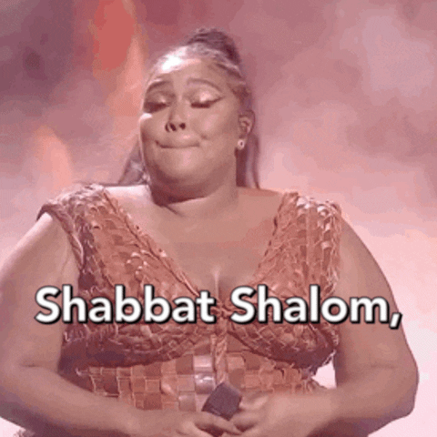 Video gif. Lizzo snaps her fingers dramatically as she says "bitch," text, "Shabbat shalom, bitch!"
