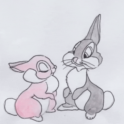 Disney gif. An animation of redrawn sketches from Bambi. A female rabbit kisses Thumper, and his ears twist around each other in surprise. A large red heart grows and shrinks in the background.