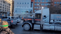 'Freedom Convoy' Trucks Blare Horns on Parliament Hill in Ottawa