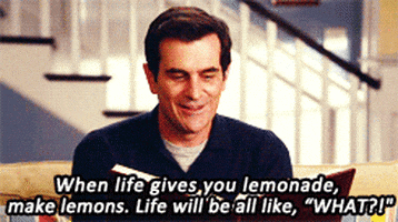 phil dunphy laughing GIF