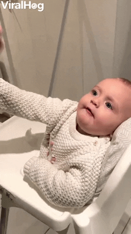 Baby Tastes Chocolate Cereal For The First Time GIF by ViralHog