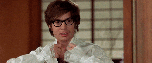 Giphy - Austin Powers Flirting GIF