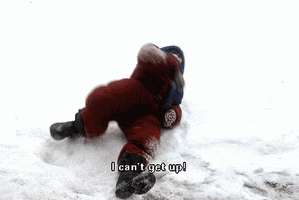 Movie gif. Wearing a snowsuit, Peter Billingsley as Ralphie in A Christmas Story rolls side to side in the snow on his back. Text, "I can't get up!"