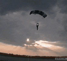 parachute unicycle GIF