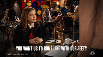 TV gif. Jane Levy as Zoey Clarke in Zoey's Extraordinary Playlist asks  John Clarence Stewart as Simon "You want us to run? Like with our feet?"