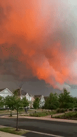 Storm Cloud Reddens in Minnesota Evening Sky