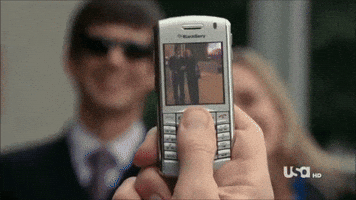 obsessions phone photo annie walker covert affairs GIF