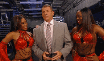 excited vince mcmahon GIF