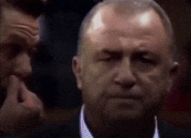 Sports gif. A montage of Fatih Terim, a former Galatasaray coach, wearing different outfits during his career as coach and manager. 