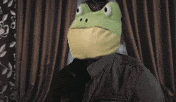 Video gif. A man with a filter that makes his face look like a frog puppet punches his fist toward us. Text, “Get out.”