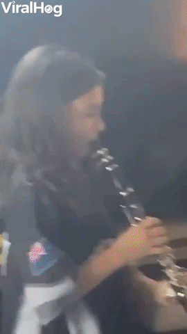Baby Sister Confused By Clarinet GIF by ViralHog