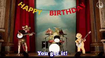 Video gif. Animatronic baby, dragon, and fox playing as a band and swaying on stage below a "happy birthday sign." Text, "You got it! Do do it. You got it."