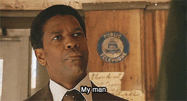 Movie gif. Denzel Washington as Frank Lucas in American Gangster looks away from us in amusement. Text, "My man."