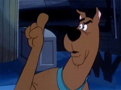 gif shows scooby doo shaking his head no