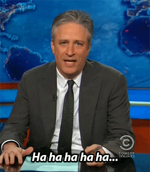 jon stewart middle finger GIF