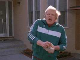 Movie gif. With the wind in his hair, Thomas F. Wilson as Biff in Back to the Future 2 looks up in the sky, looking perplexed and asks, “What the hell is going on here?”