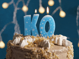 Video gif. Closeup on candle letters on top of a birthday spelling KO. The words, "Lights out for Charlo" fly in, extinguishing the candles and the light bulbs in the background all at once. 