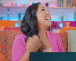 TV gif. Evelyn Castro in Porta Dos Fundos. She looks over her shoulder cutely and waves a hand at her face, insinuating that something or someone is just too hot! 