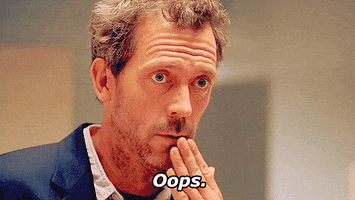 TV gif. Hugh Laurie as Dr. House sarcastically covers his mouth as he says with zero sincerity: Text, "Oops."
