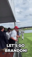 Donald Trump Pumps Fists At LIV Golf Crowd