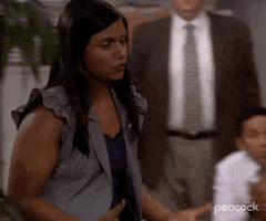 The Office gif. Mindy Kaling as Kelly walks through the office pumping her forearms emphatically and yelling, "Shut it down!" while her co-workers look on.
