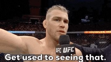 Sports gif. After finishing a match, Jake Matthews gives an interview and bluntly says, "Get used to seeing that."