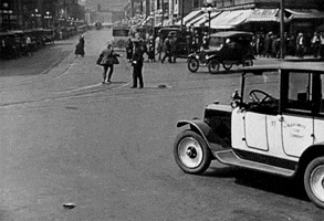 harold lloyd lol he just gets run over and the cop is like wait stop u car GIF by Maudit