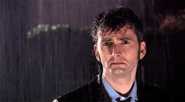 disappointed standing in the rain GIF