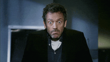 TV gif. Hugh Laurie as Dr. House in House stares with big eyes as he throws out his hands in a shrug.