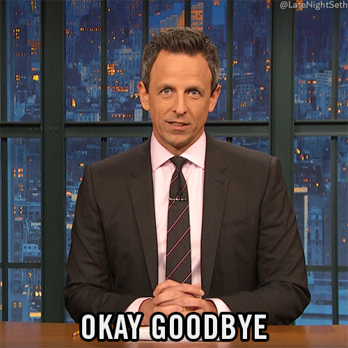 TV gif. Seth Meyers at his desk on Late Night with Seth Meyers raises his eyebrows and waves a hand energetically at us, mouthing the words that appear as text below, "Okay Goodbye."