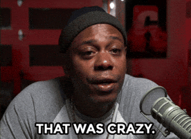 Celebrity gif. Dave Chappelle, speaking into a broadcast microphone, says "that was crazy."