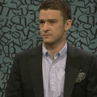Celebrity gif. Justin Timberlake looking awkwardly stunned and nervous, with a straight face and subtle roving eyes.
