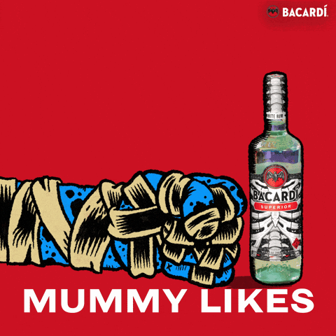 Sponsored gif. A Halloween-themed bottle of Bacardi next to a mummy hand giving a thumbs up. Text reads "MUMMY LIKES."