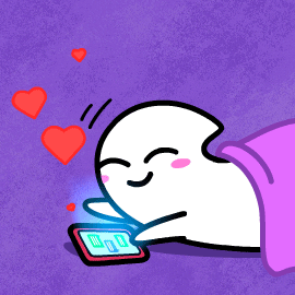 Cartoon gif. A ghost with rosey cheeks and a happy smile is covered by a blanket while lying on the floor. The ghost continuously taps her phone screen and hearts fly out of her phone. 