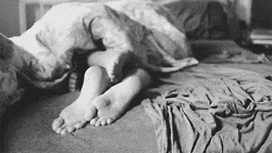 Partners getting intimate on bed
