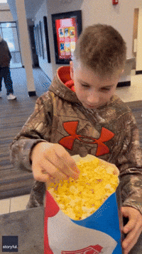 Boy Teaches Mom Neat Life Hack for Putting Butter in Movie Popcorn