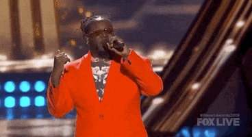 iheartradio music awards red suit GIF by iHeartRadio