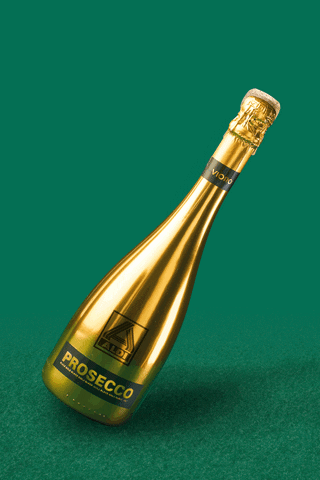 Ad gif. Bottle of Aldi prosecco trembles and then the cork breaks through the gold foil wrapping.