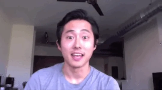 Excited Steven Yeun GIF