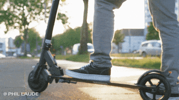 PhilLaude comedy scooter riding escooter GIF