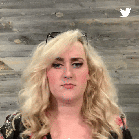 Meme gif. Brittany Broski, Kombucha Girl, references her famous tik tok video, frowning in disgust, then suddenly looking intrigued as exclamation points pop up next to her head. Then she frowns and says, "No," but then tilts her head yet again, looking intrigued as she says, "Well," as she giggles and smiles. 