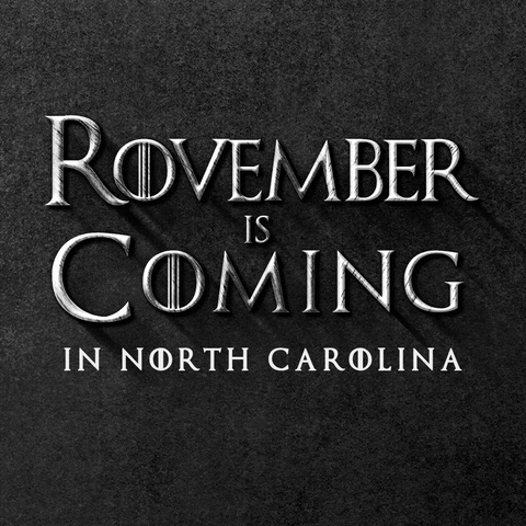 Text gif. In gray Game of Thrones font against a stony black background reads the message, “Rovember is Coming in North Carolina.”
